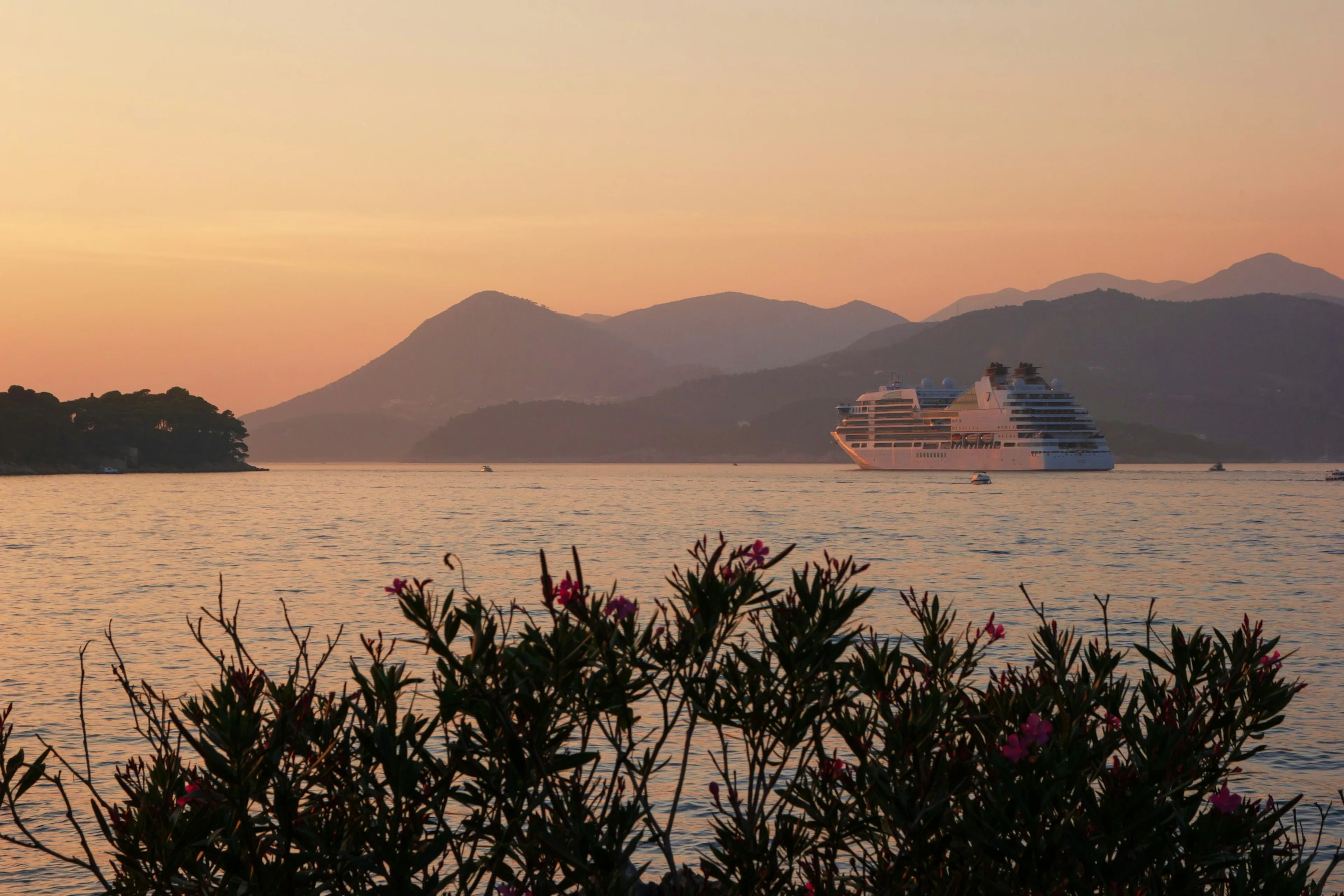 Luxury cruise ship on Mediterranean sea at sunset