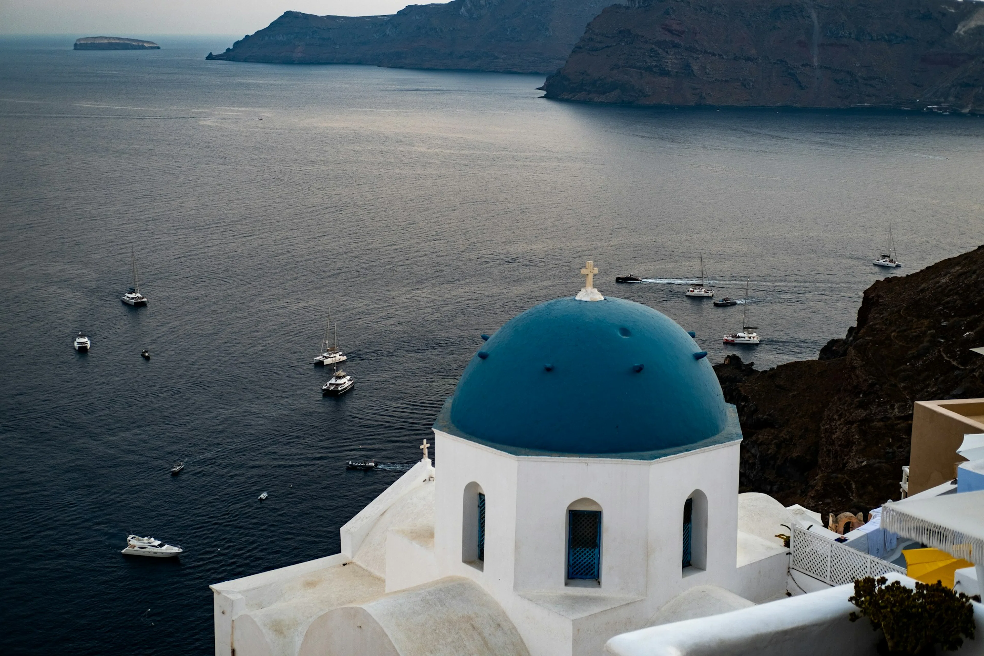 Santorini blue dome and Aegean Sea