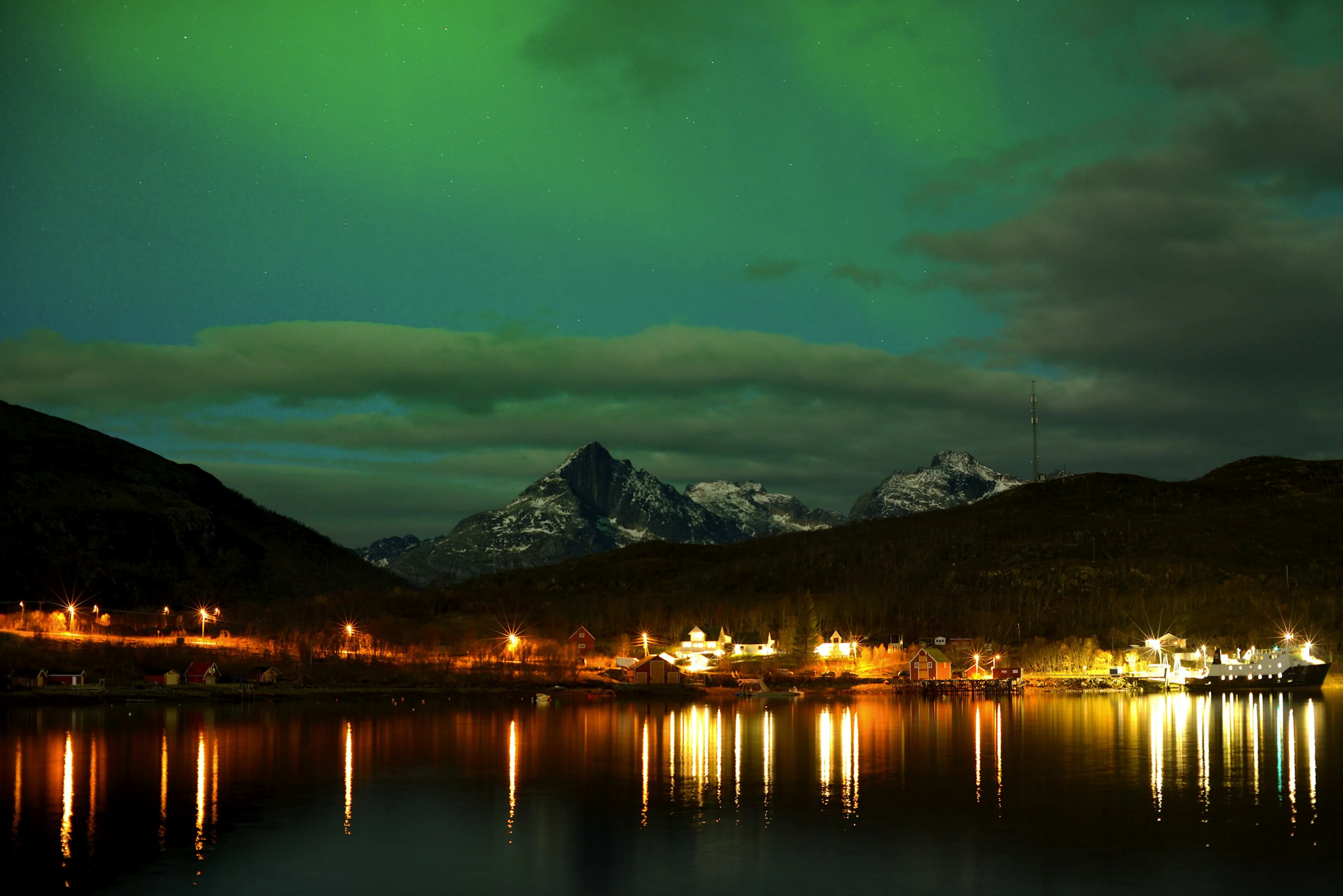 Aurora borealis over Arctic harbour
