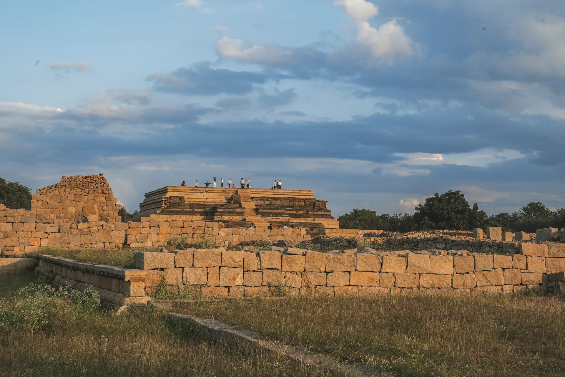 Ancient stone ruins under a cloudy sky